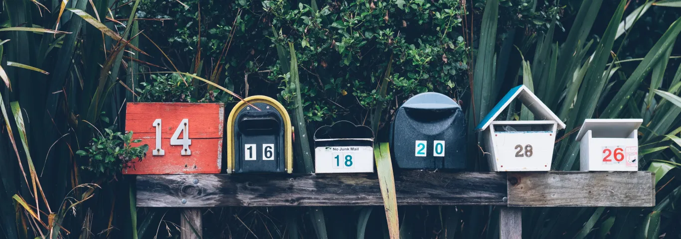 row of six mailboxes