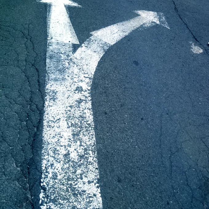 arrows splitting off in two different directions